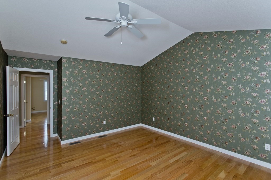 210 Johnson Road, Unit 5 Chicopee, MA 01022 - Photo 13 of 19 a view of empty room with wooden floor