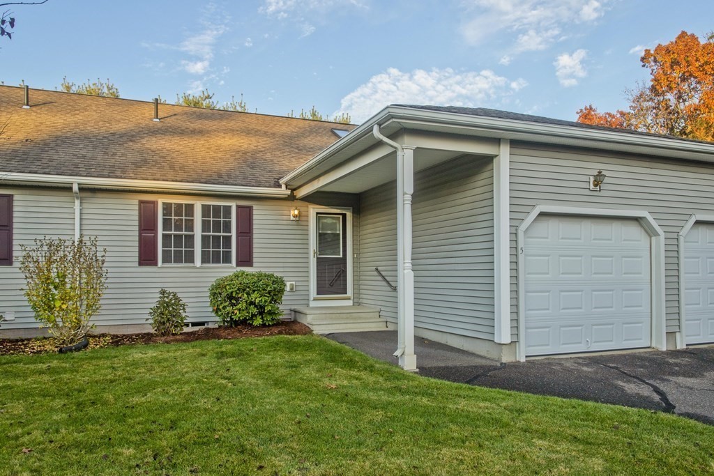 210 Johnson Road, Unit 5 Chicopee, MA 01022 - Photo 2 of 19 a view of a house with a backyard