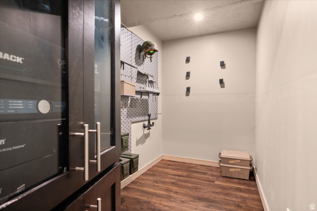 3359 Eurasian Crane Road Clinton, UT 84015 - Photo 53 of 71 Mudroom featuring dark wood finished floors and baseboards