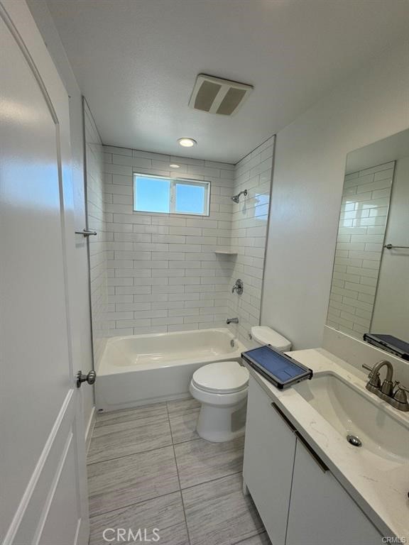 5875 San Pedro Street Los Angeles, CA 90003 - Photo 7 of 17 a bathroom with a sink a toilet and shower