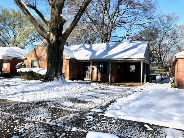 1633 Ivy Road Memphis, TN 38117 - Photo 2 of 14 a view of a house with a yard