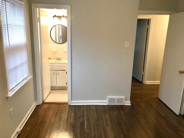 1633 Ivy Road Memphis, TN 38117 - Photo 9 of 14 a view of a bathroom with wooden floor
