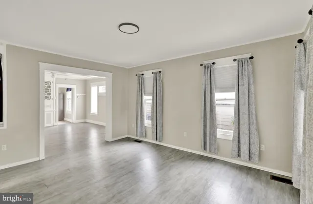 a view of livingroom with hardwood floor and window