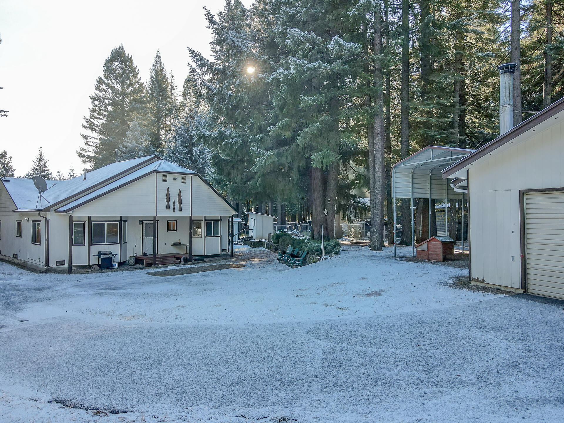 9390 Thatcher Mill Road Shingletown, CA 96088 - Photo 35 of 39 a view of a house with a yard