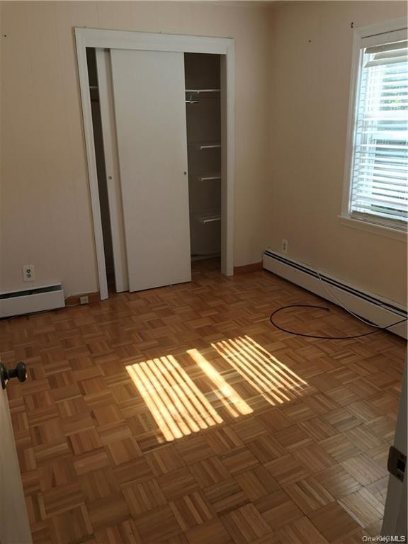 286 Columbus Avenue, Unit 2 West Harrison, NY 10604 - Photo 8 of 8 a view of an empty room and window