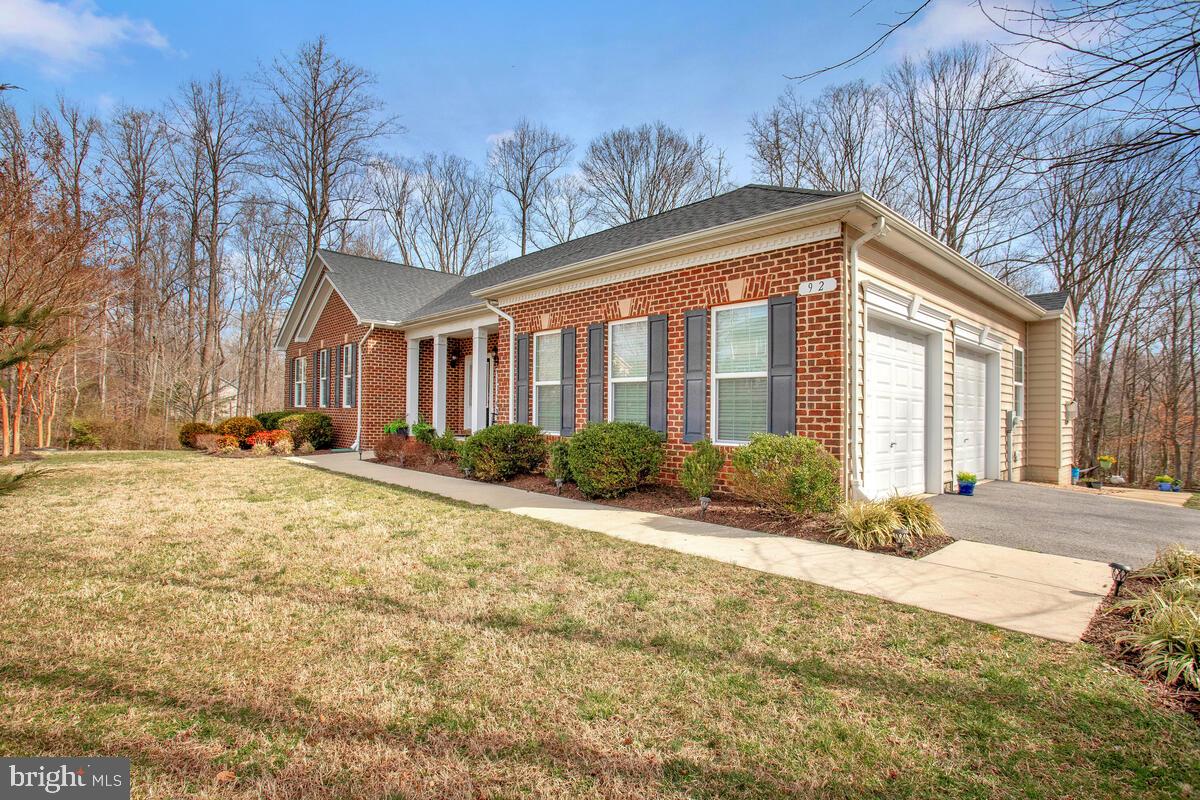 92 Simmons Ridge Road Prince Frederick, MD 20678 - Photo 8 of 46 the home has a brick front