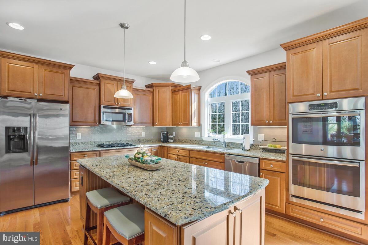 92 Simmons Ridge Road Prince Frederick, MD 20678 - Photo 9 of 46 gourmet kitchen with granite and stainless steel