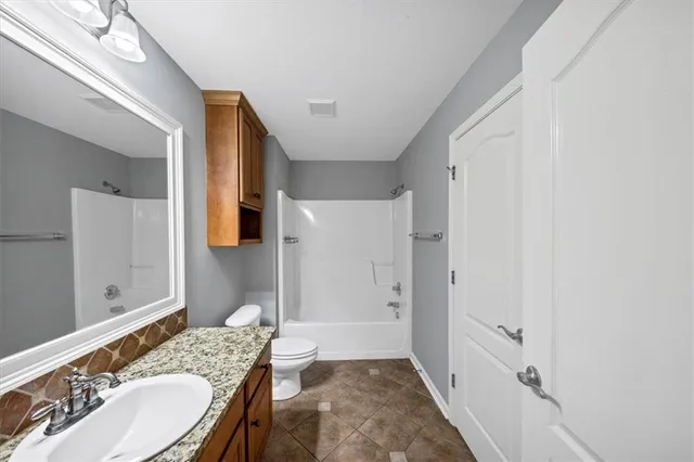 a white building with glass door