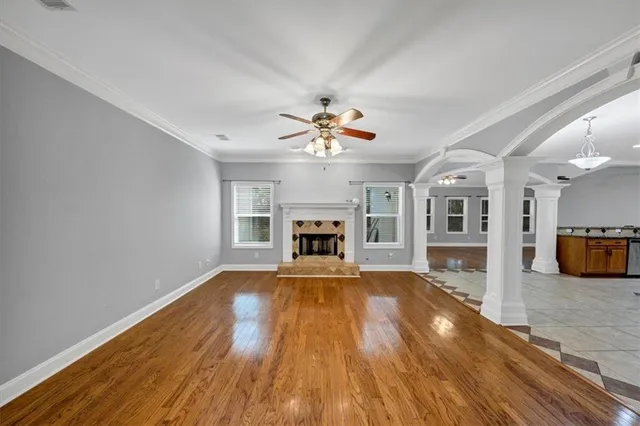 a kitchen with stainless steel appliances granite countertop a refrigerator and a stove