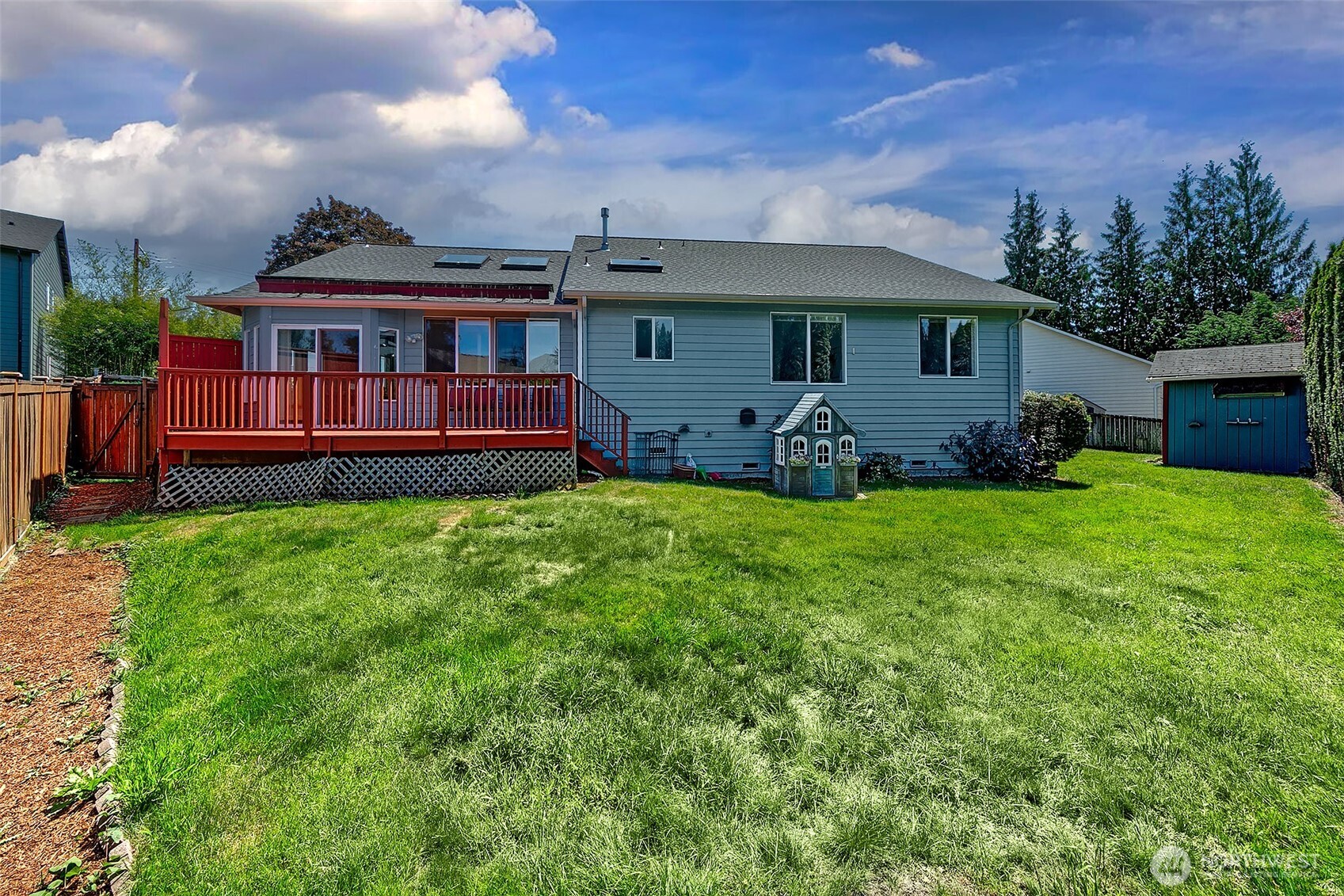 20604 Damson Road Lynnwood, WA 98036 - Photo 22 of 24 a view of a house with backyard and sitting area