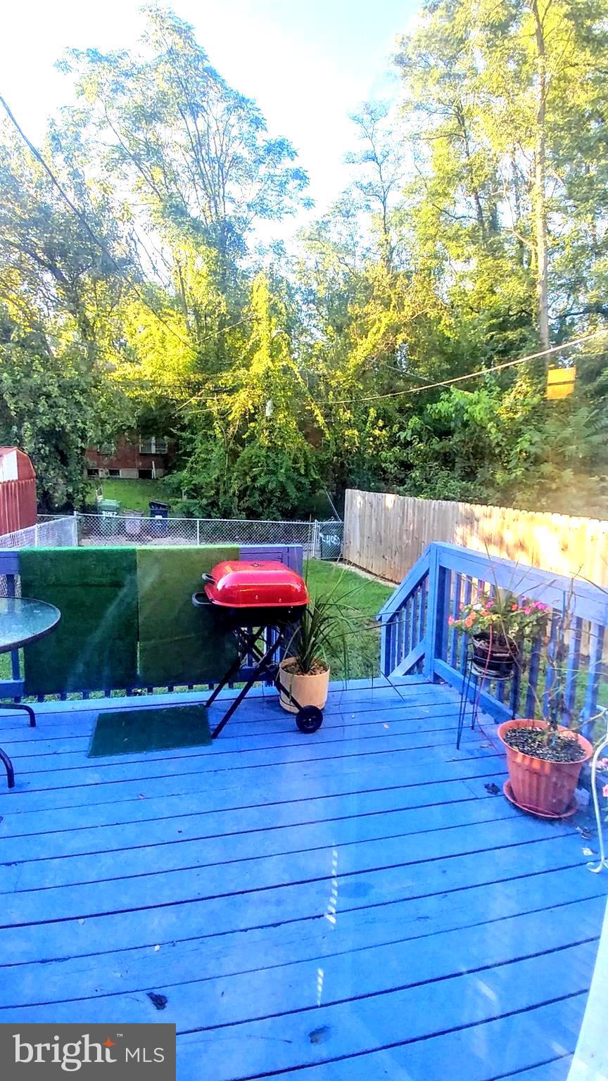 4052 Hilton Road Baltimore, MD 21215 - Photo 18 of 22 Rear deck and Yard