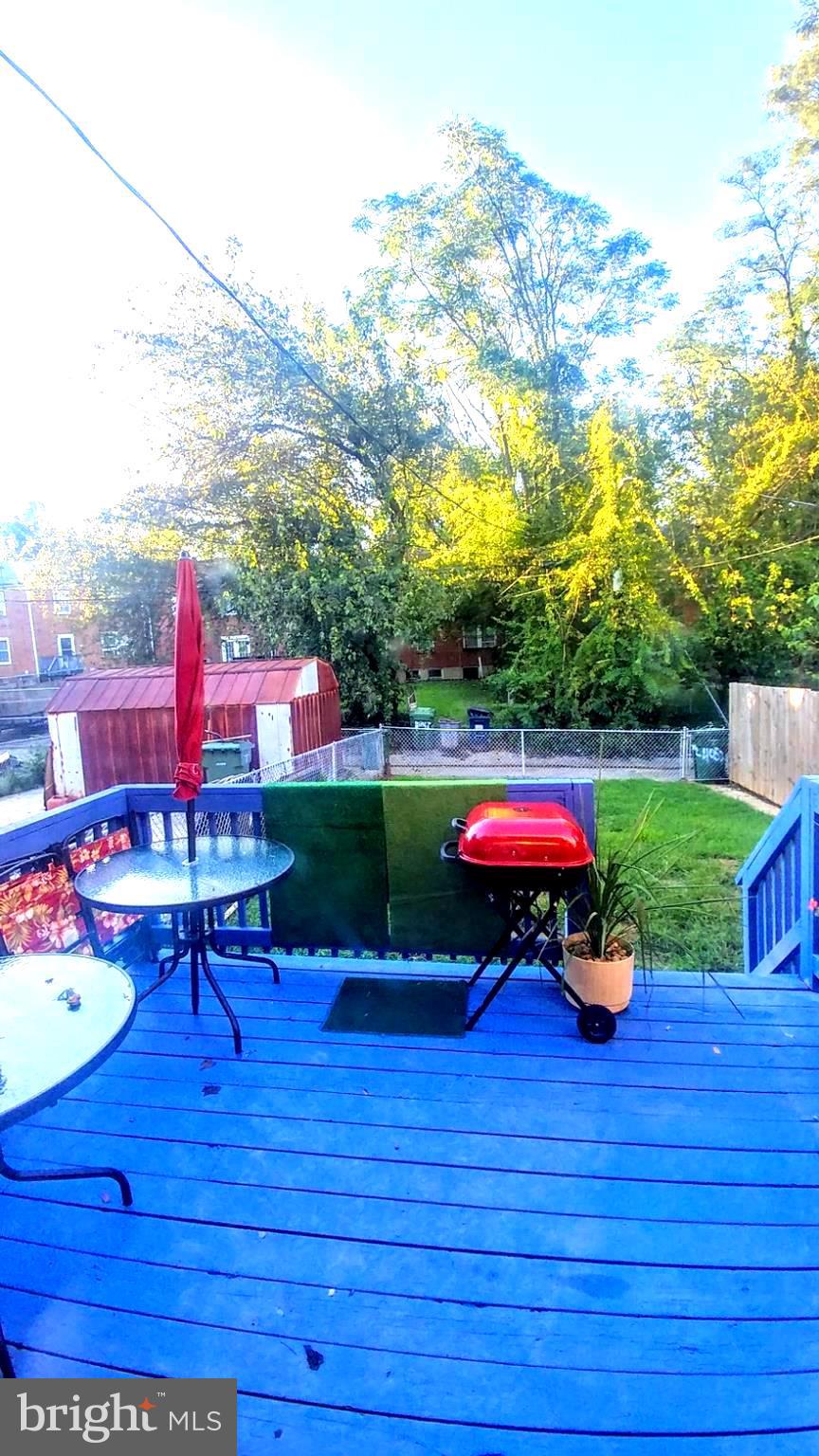 4052 Hilton Road Baltimore, MD 21215 - Photo 19 of 22 Rear deck and yard
