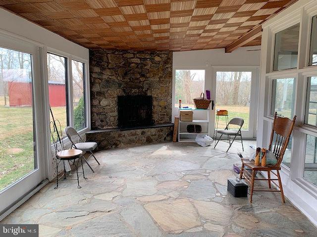 20070 Airmont Road Round Hill, VA 20141 - Photo 5 of 18 Sun room fireplace is wood burning