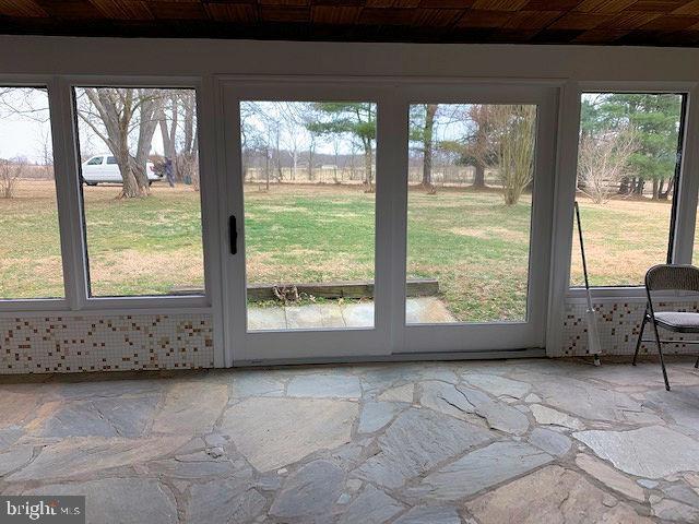 20070 Airmont Road Round Hill, VA 20141 - Photo 6 of 18 Sun room has stone flooring