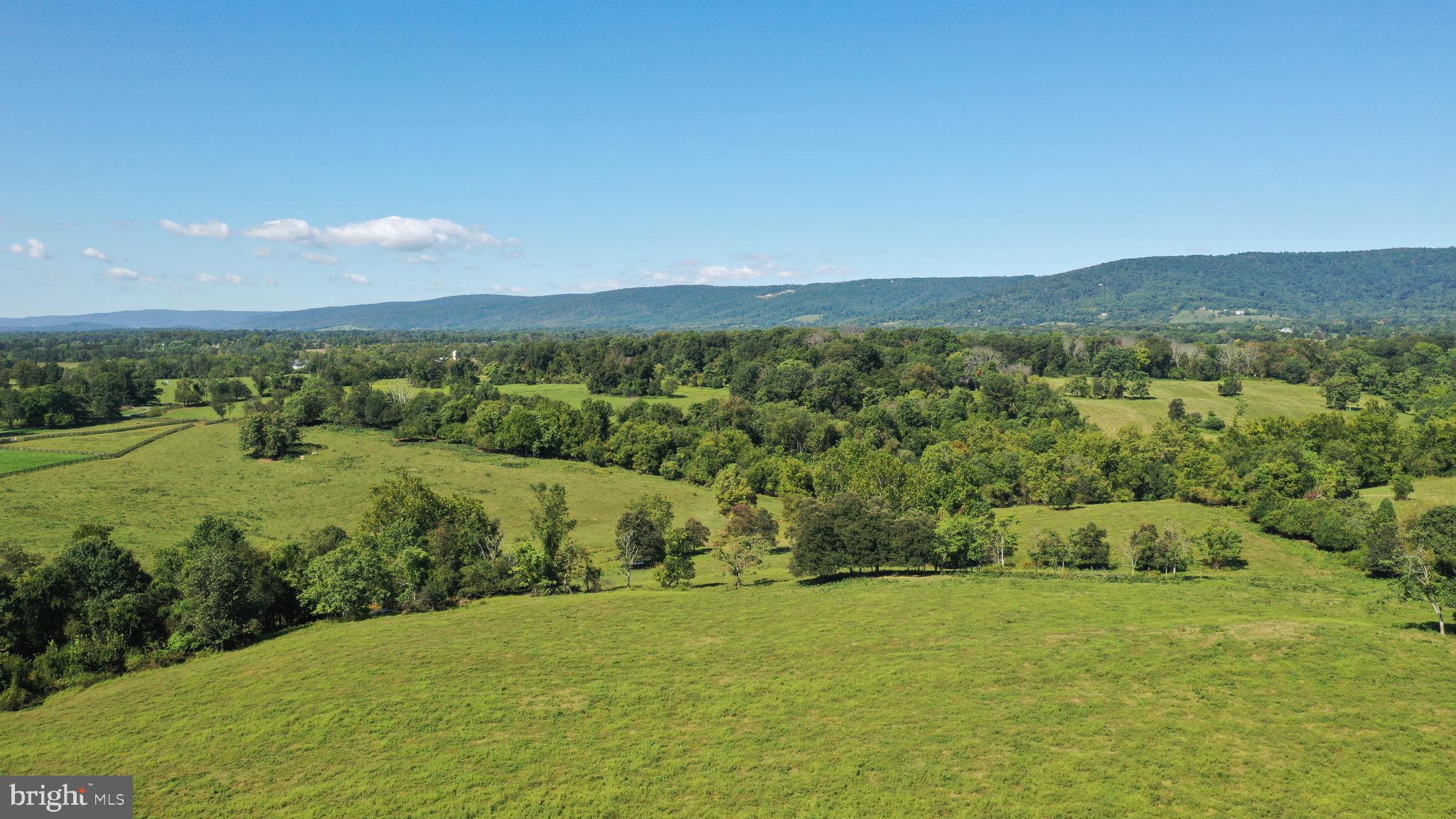 20070 Airmont Road Round Hill, VA 20141 - Photo 7 of 18 2 level acres surrounded by conserved farm land