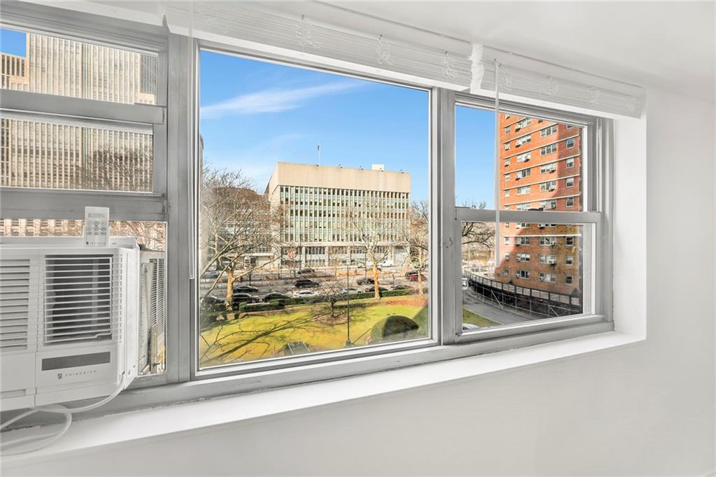 225 Adams Street, Unit 4E Brooklyn, NY 11201 - Photo 15 of 15 a view of a room that has a bed and a window