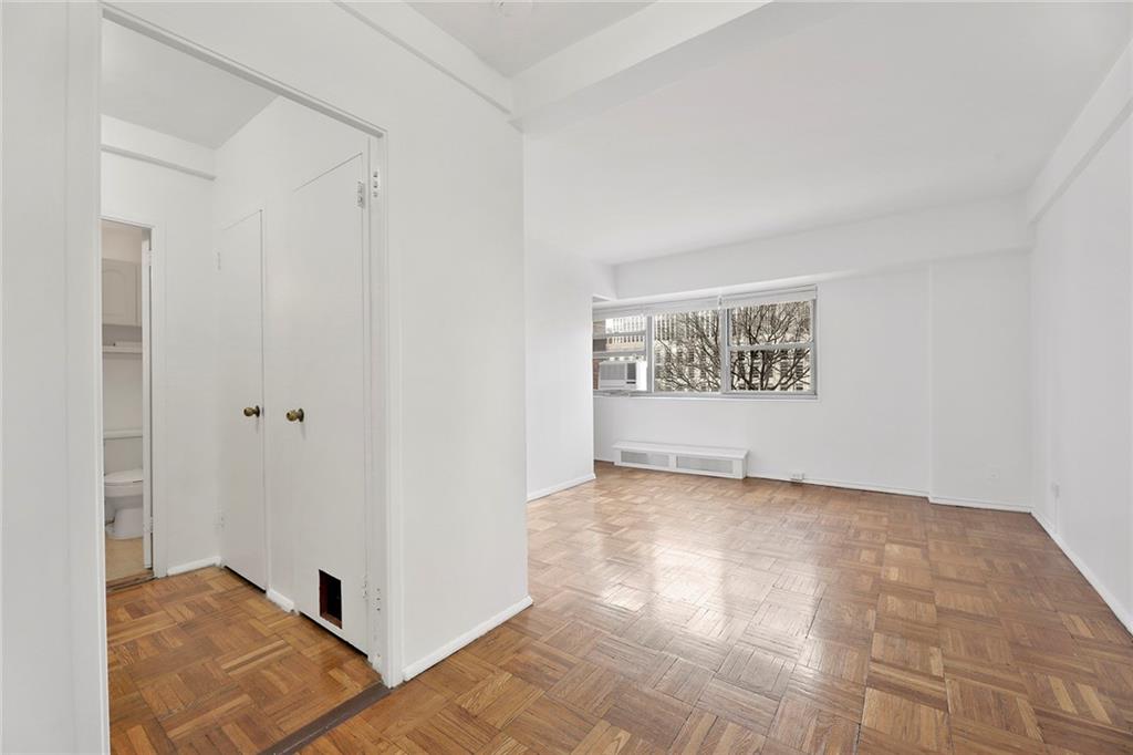 225 Adams Street, Unit 4E Brooklyn, NY 11201 - Photo 7 of 15 a view of an empty room with a window