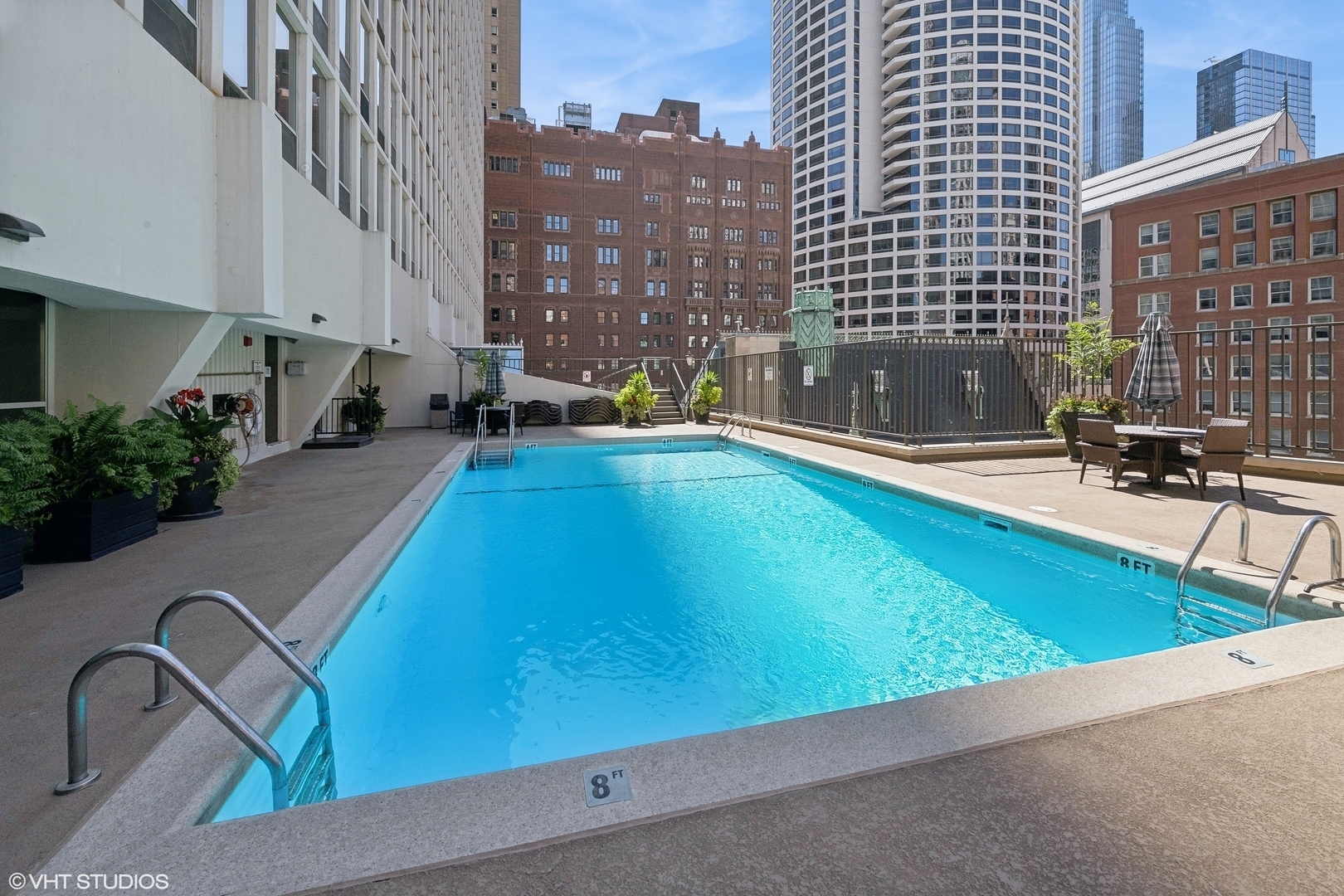 111 East Chestnut Street, Unit 38C Chicago, IL 60611 - Photo 30 of 39 a view of a swimming pool with outdoor seating