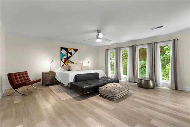 a living room with furniture and windows