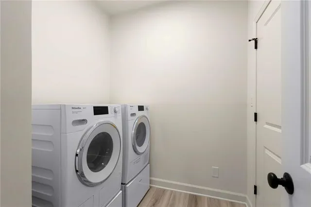 a utility room with dryer and washer