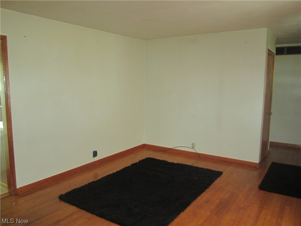 200 Summit Road Marietta, OH 45750 - Photo 16 of 35 Spare room with light hardwood flooring