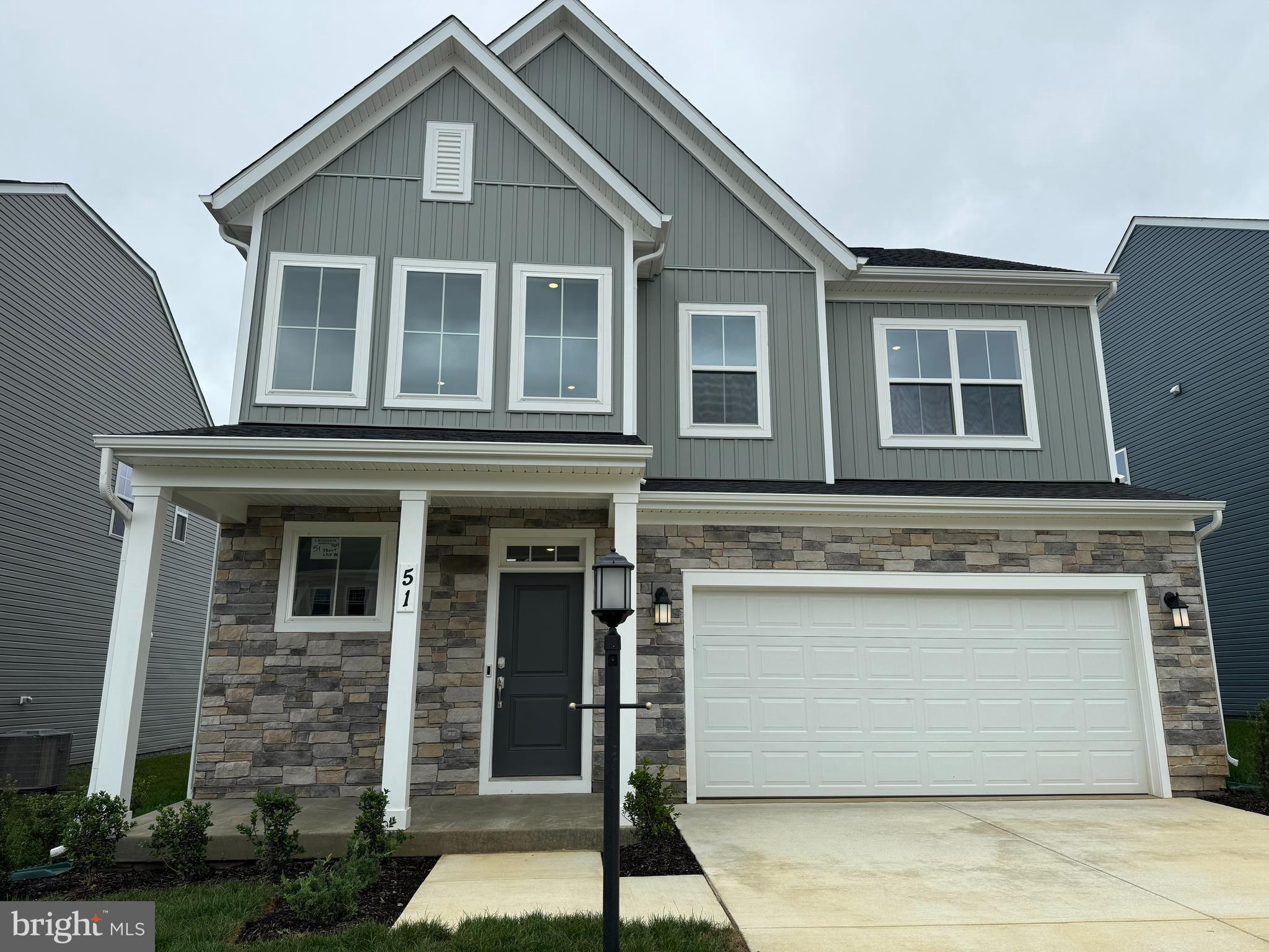 51 Trout Lily Drive Ranson, WV 25438 - Photo 1 of 15 a front view of a house with a yard