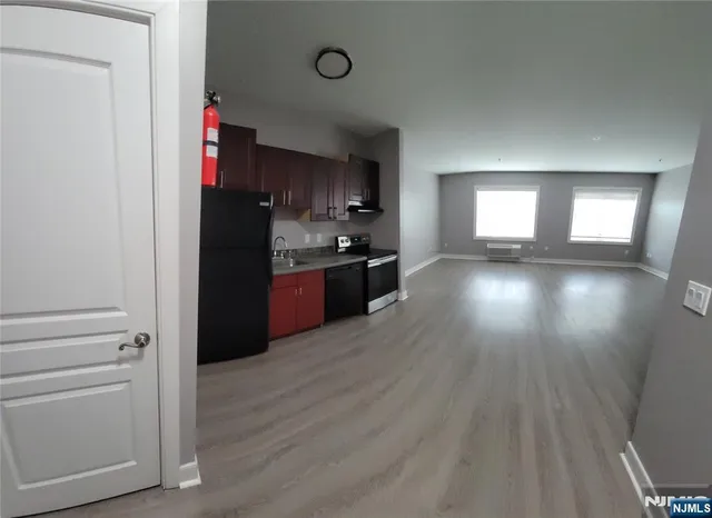 a view interior of kitchen and wooden floor