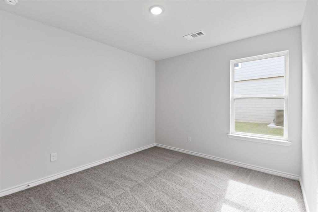 5024 Cervinae Road Crowley, TX 76036 - Photo 11 of 38 an empty room with a window