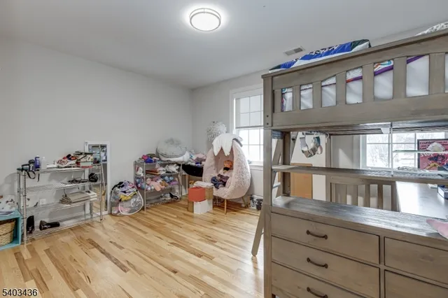 a bedroom with furniture and a bed