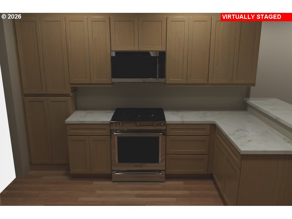 36290 7th Street Nehalem, OR 97131 - Photo 10 of 37 a kitchen with a stove and a microwave