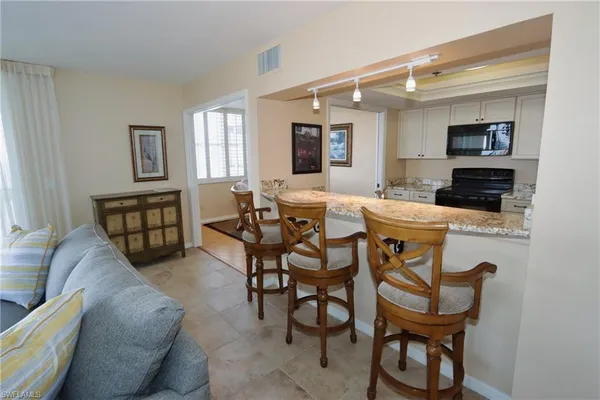 $14,000 | 5550 Heron Point Drive, Unit 2004, Naples, FL 34108