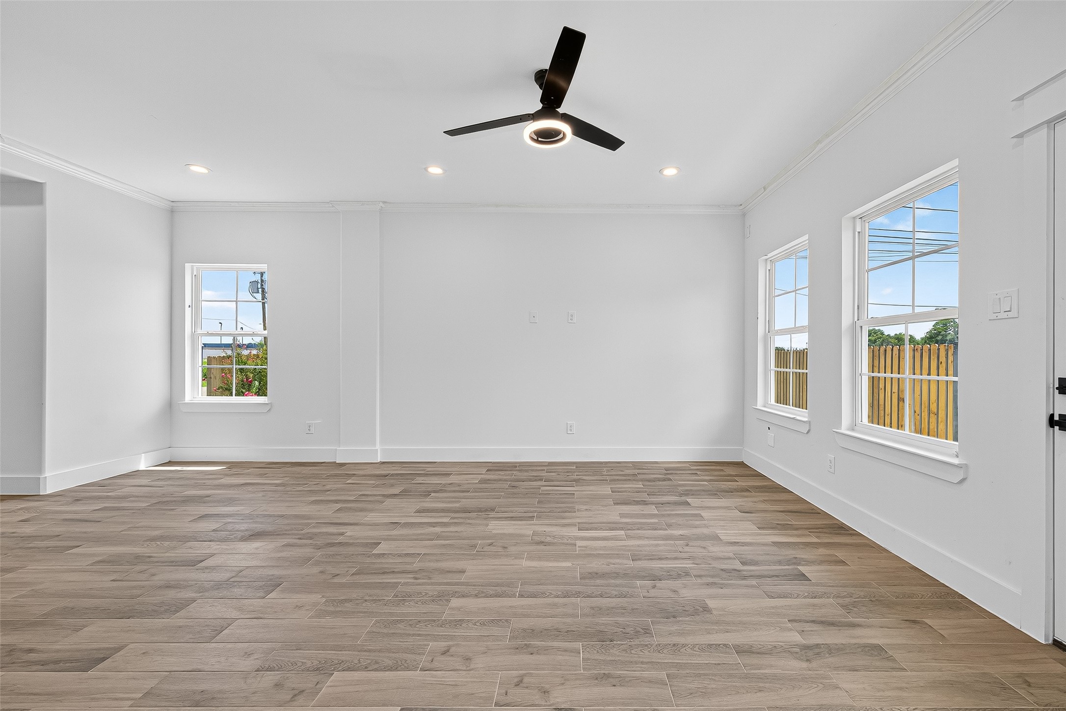 3168 Golfcrest Houston, TX 77087 - Photo 3 of 14 a view of an empty room with a window