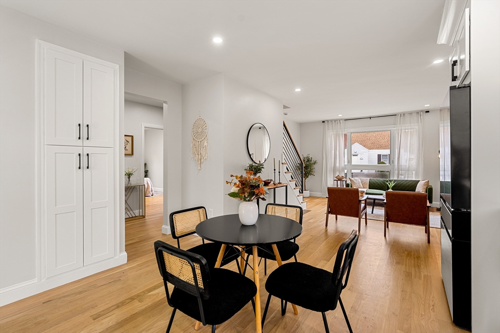 7 Davis Street Saugus, MA 01906 - Photo 11 of 42 a view of a dining room with furniture and wooden floor