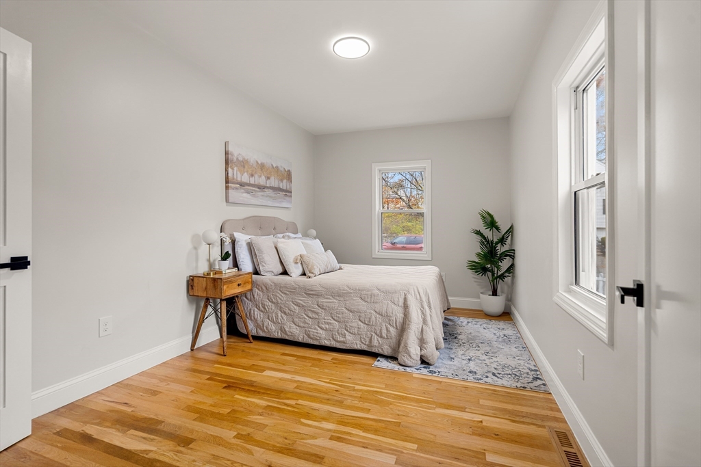 7 Davis Street Saugus, MA 01906 - Photo 19 of 42 a bedroom with a bed and a window