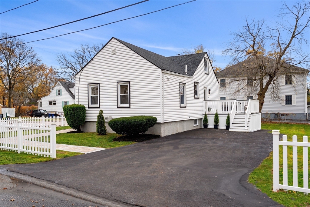 7 Davis Street Saugus, MA 01906 - Photo 2 of 42 a view of a house with a yard and porch