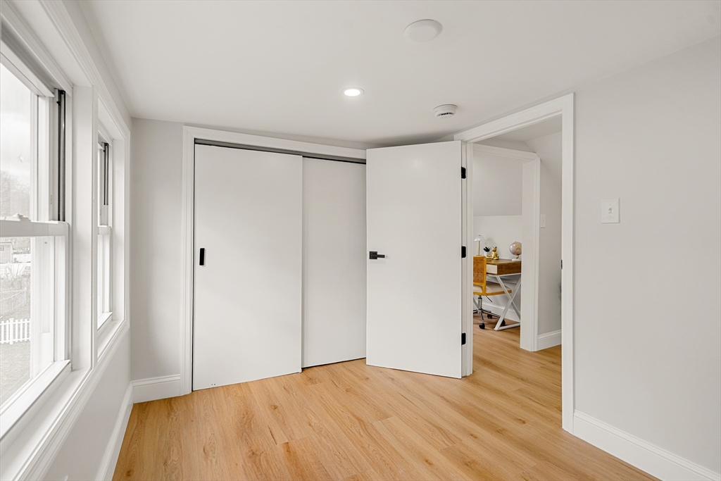 7 Davis Street Saugus, MA 01906 - Photo 26 of 42 a view of empty room with wooden floor