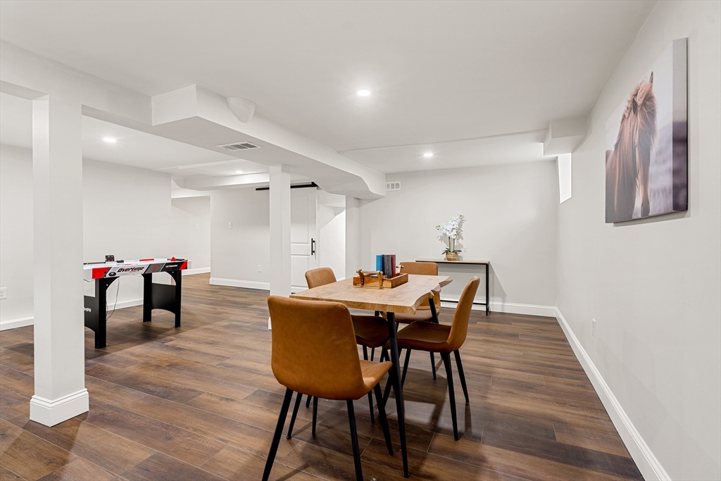 7 Davis Street Saugus, MA 01906 - Photo 32 of 42 a view of a dining room with furniture and wooden floor