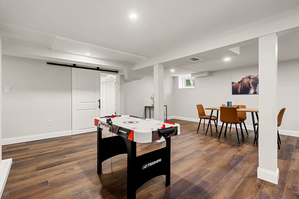 7 Davis Street Saugus, MA 01906 - Photo 33 of 42 a view of a dining room with furniture and wooden floor