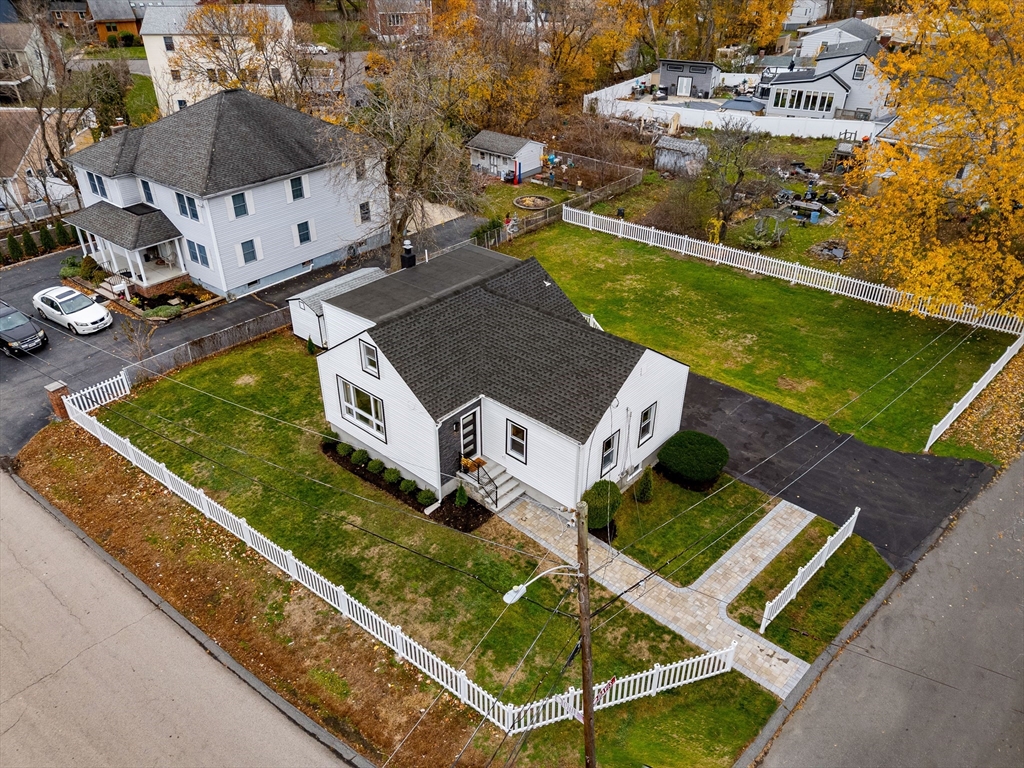 7 Davis Street Saugus, MA 01906 - Photo 39 of 42 an aerial view of a house with a garden and swimming pool
