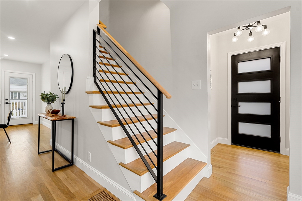 7 Davis Street Saugus, MA 01906 - Photo 6 of 42 a view of a living room and wooden floor