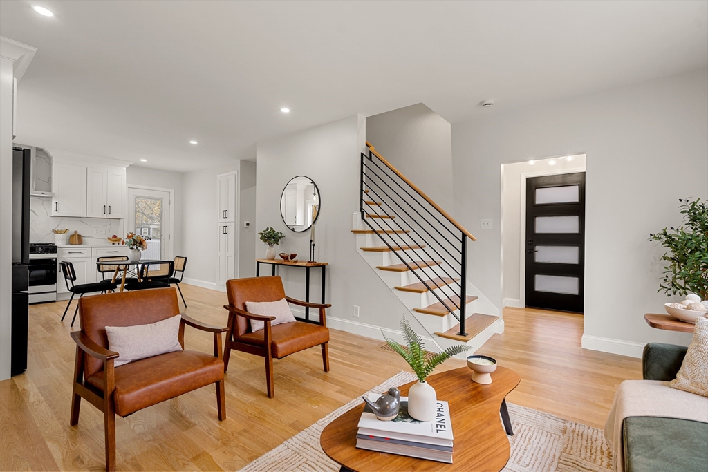 7 Davis Street Saugus, MA 01906 - Photo 7 of 42 a living room with furniture and wooden floor
