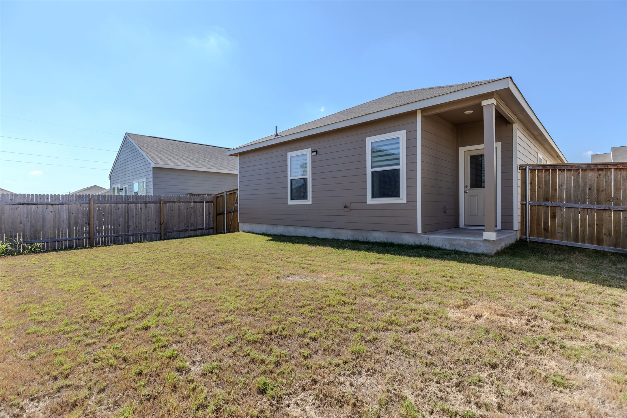 104 Enforcer Loop Jarrell, TX 76537 - Photo 11 of 12 a view of a backyard