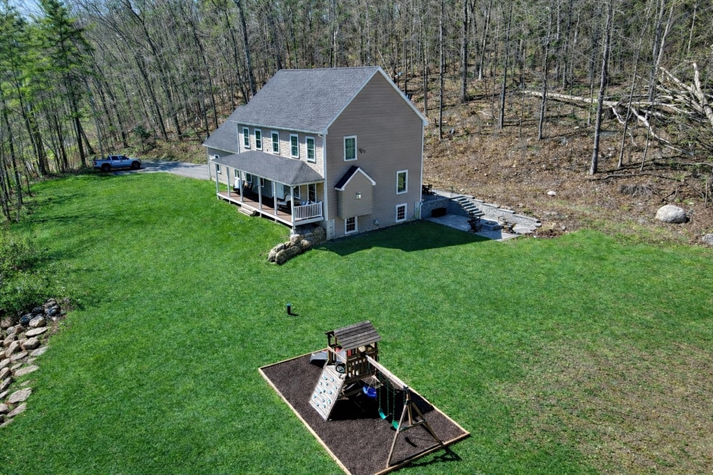 103 Rice Corner Road Brookfield, MA 01506 - Photo 37 of 39 an aerial view of a house