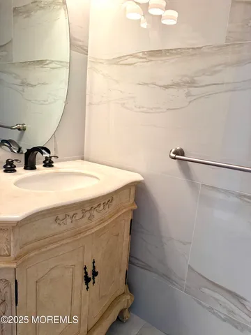 a bathroom with a sink and a vanity