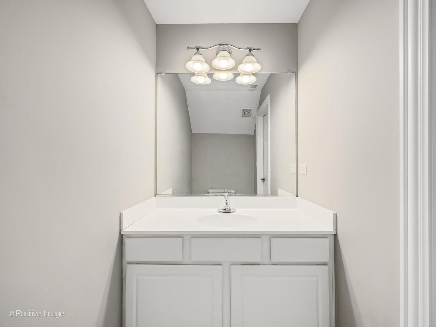 11 Foxcroft Road, Unit 115 Naperville, IL 60565 - Photo 9 of 17 a sink with a mirror