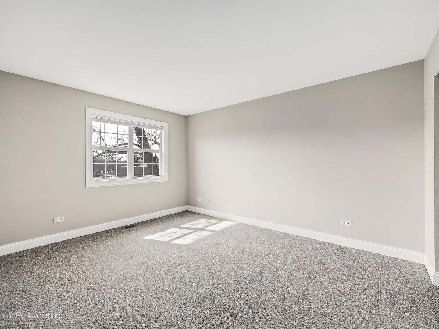 11 Foxcroft Road, Unit 115 Naperville, IL 60565 - Photo 10 of 17 an empty room with windows