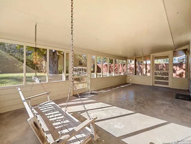 a view of a house with a empty space and windows