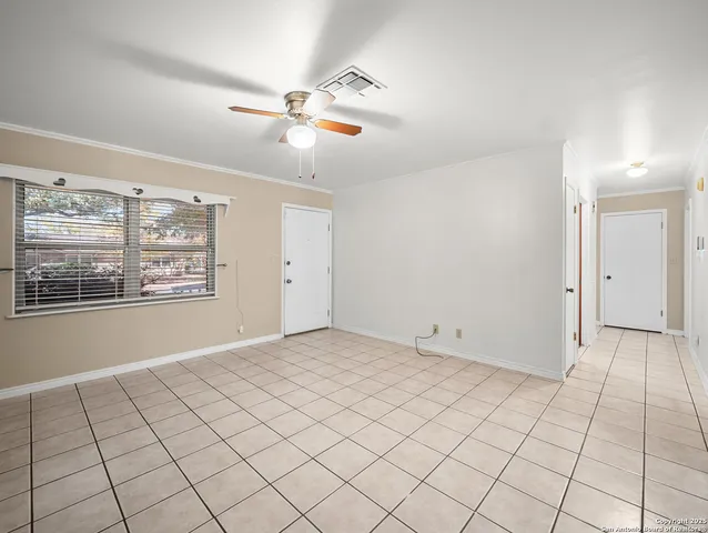 a view of an empty room with window