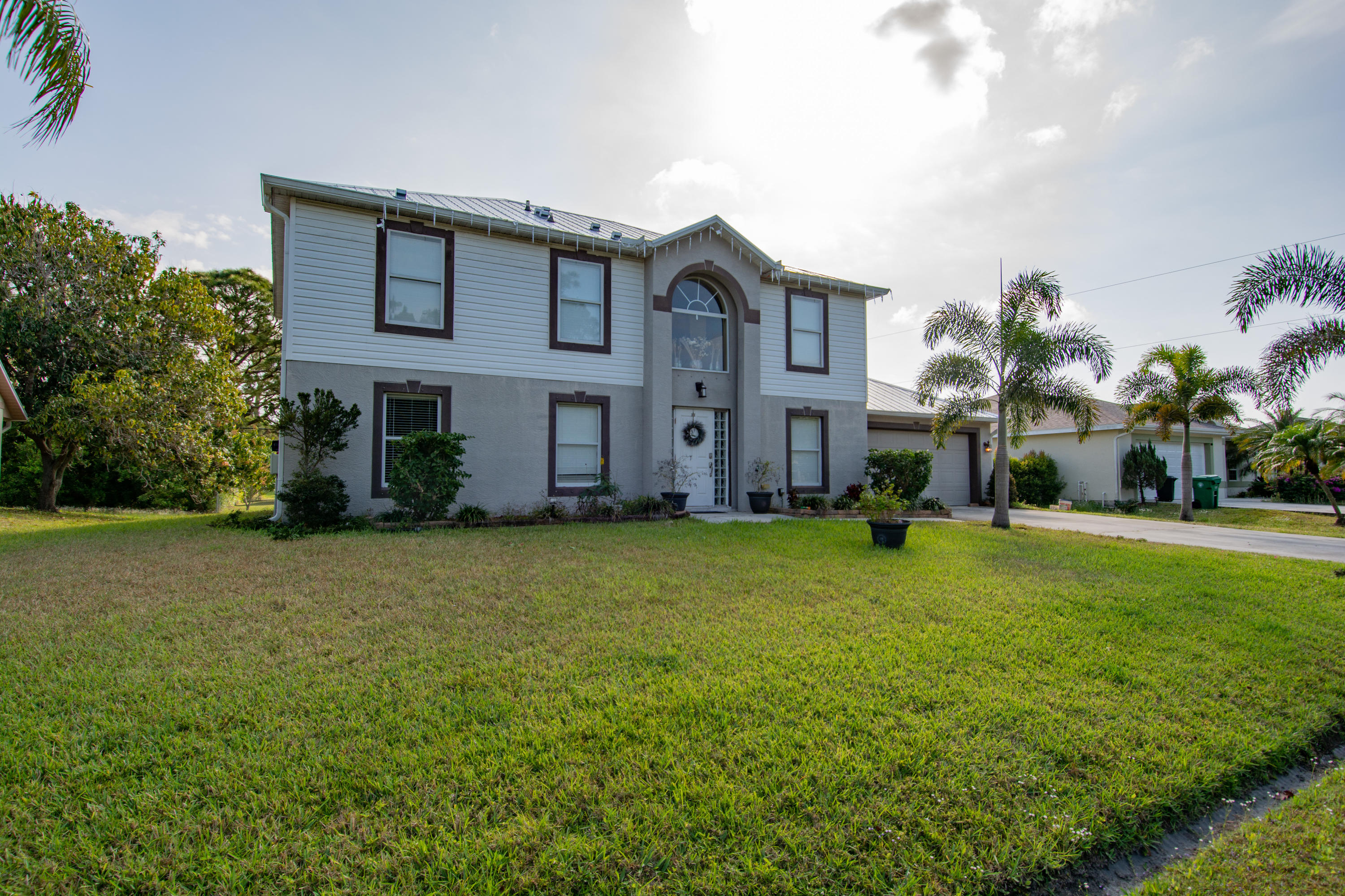 1925 Southwest Libra Lane Port St. Lucie, FL 34984 - Photo 1 of 33 Front