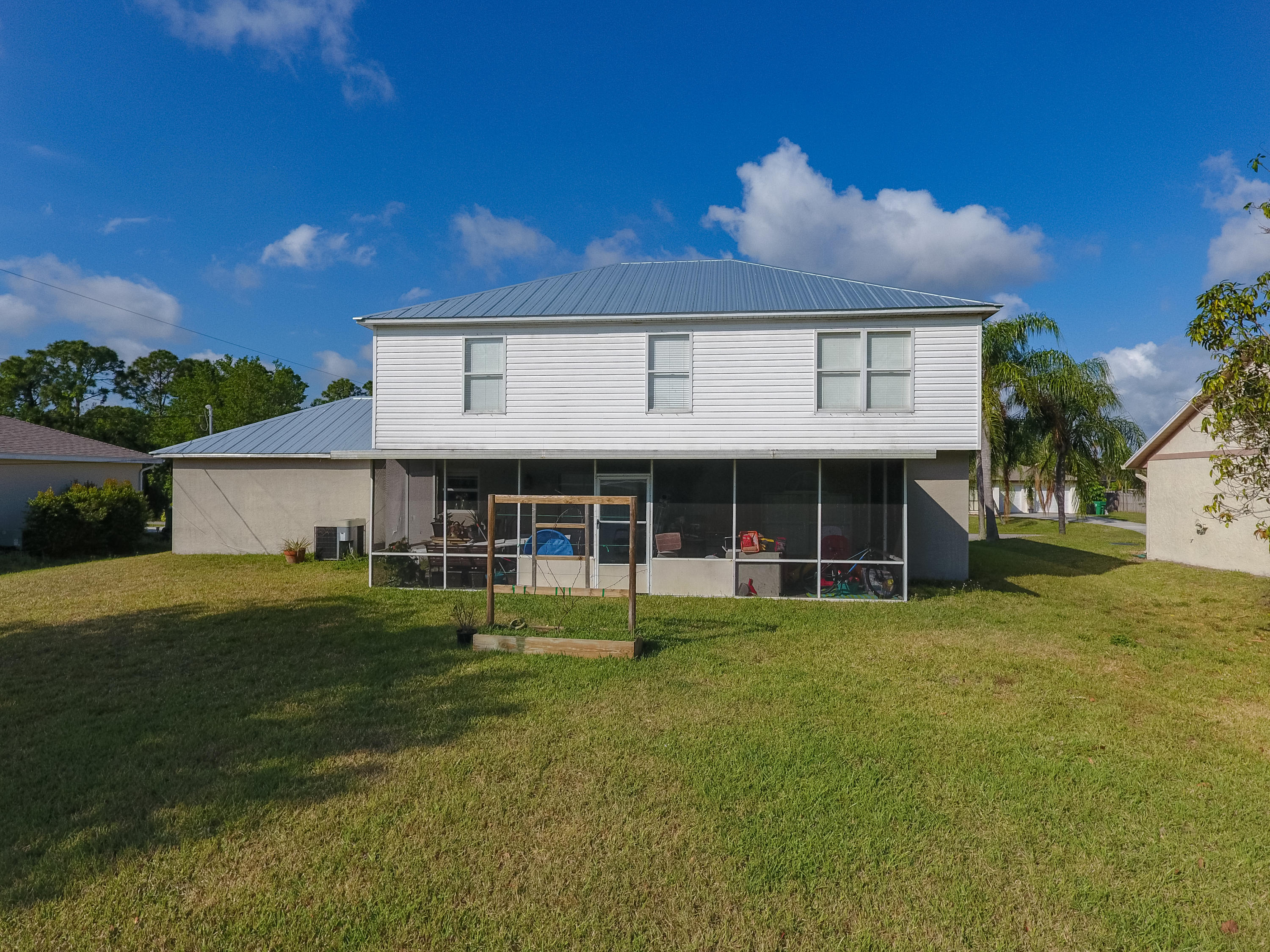 1925 Southwest Libra Lane Port St. Lucie, FL 34984 - Photo 27 of 33 15_Patio &Yard (2)